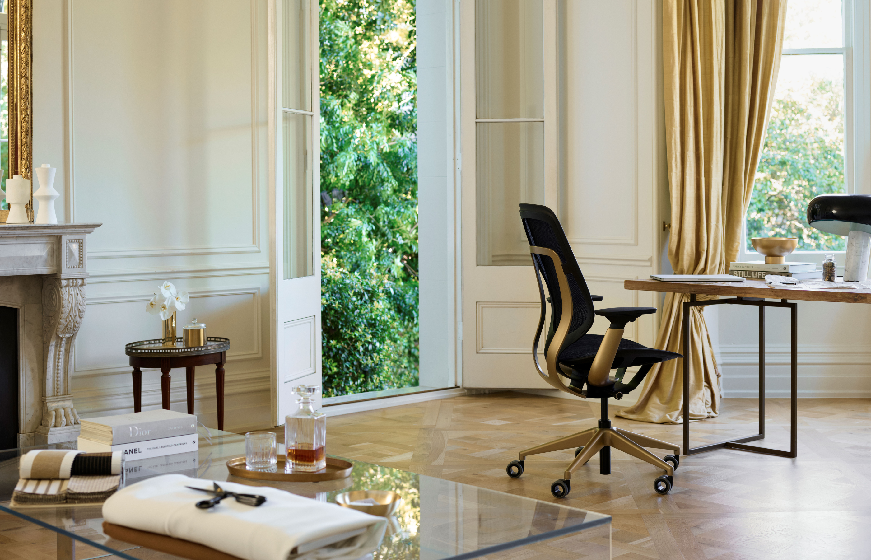 Modern office setup with a chair, desk, and decor in a bright room.