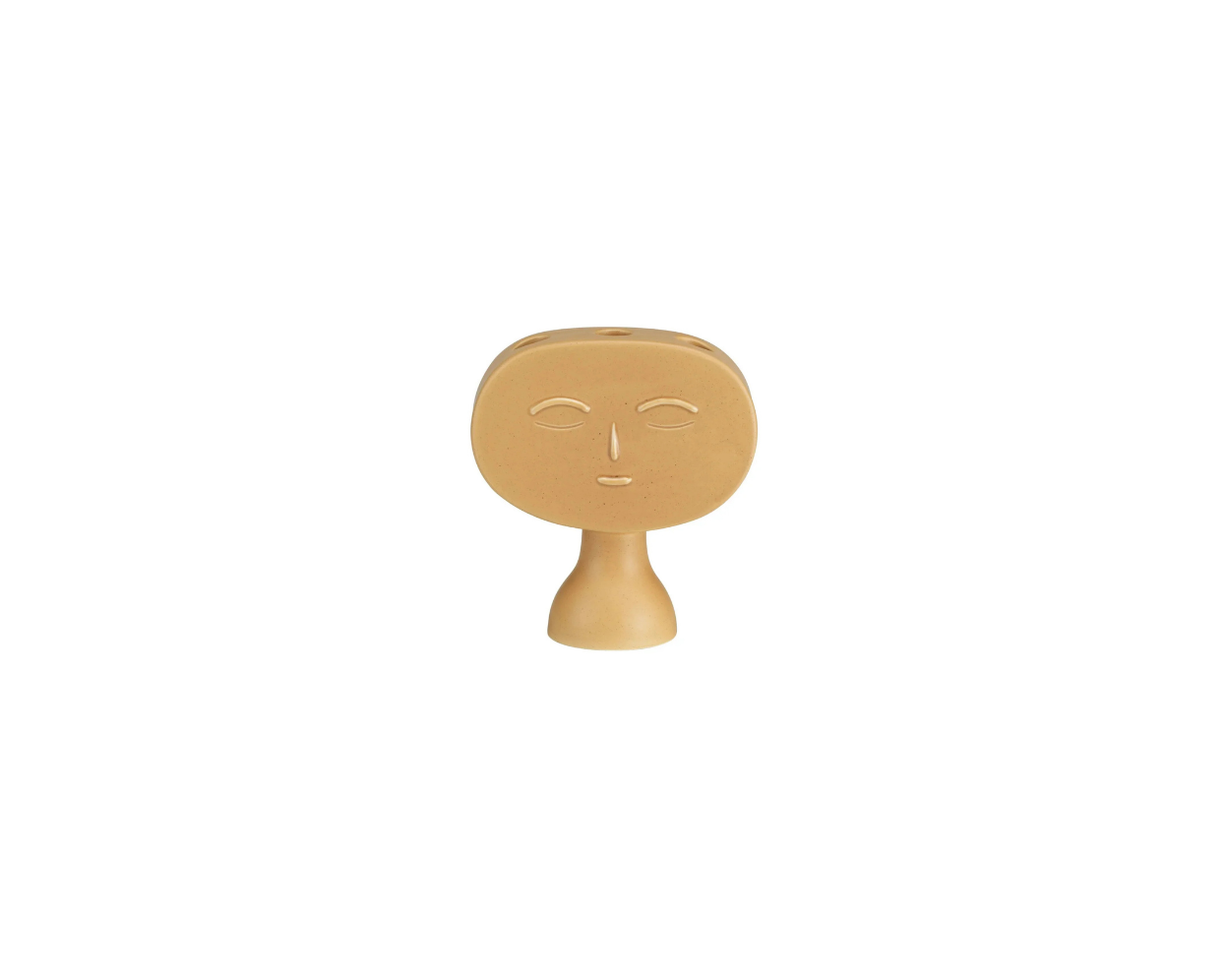 Decorative object with a face design on a white background
